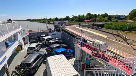 vehicles boarding a ferry at blaye, france