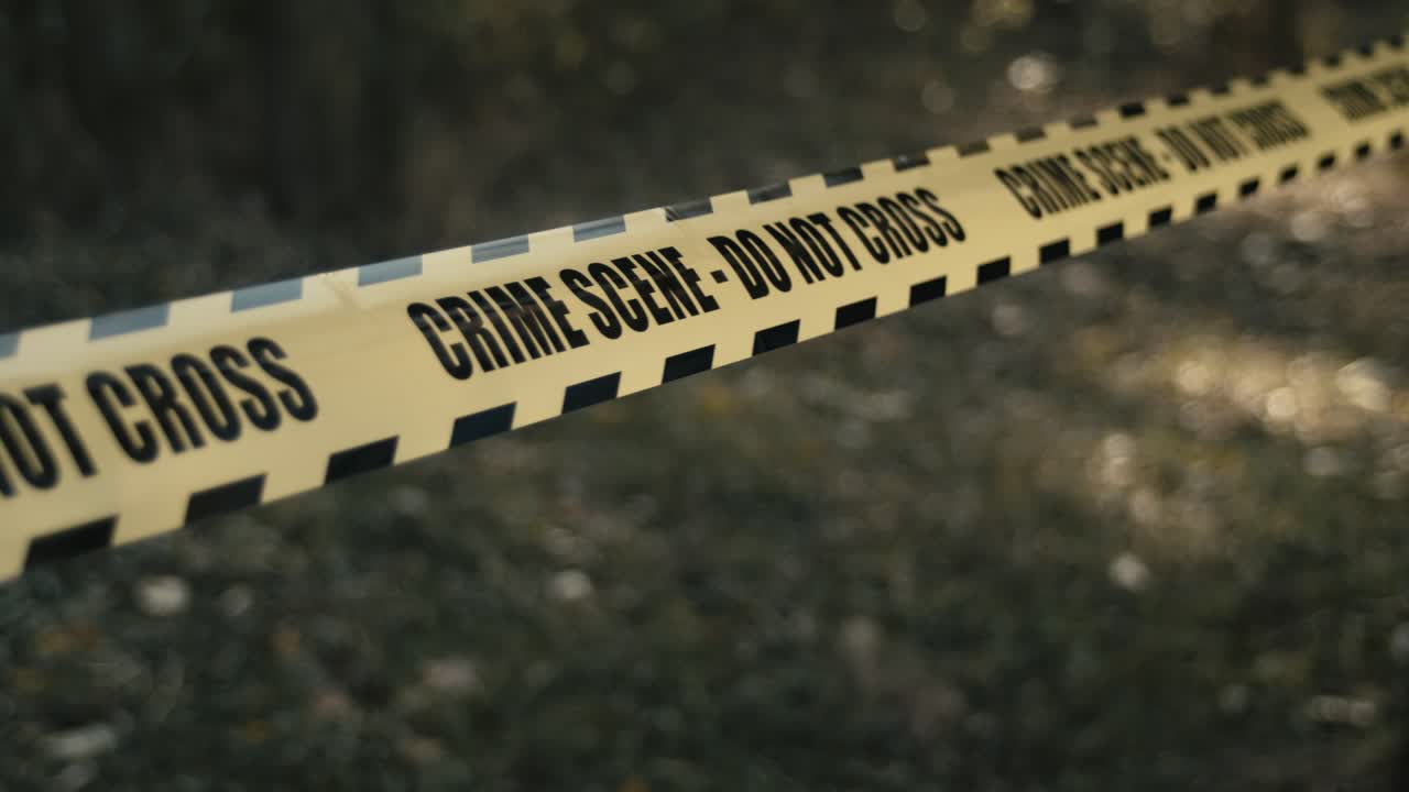 Crime scene do not cross stripe, restricted area during investigation