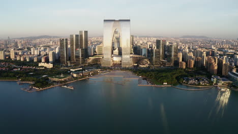 cbd buildings by the lake. aerial in suzhou, china.