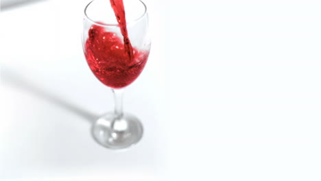 Red-wine-being-poured-in-super-slow-motion