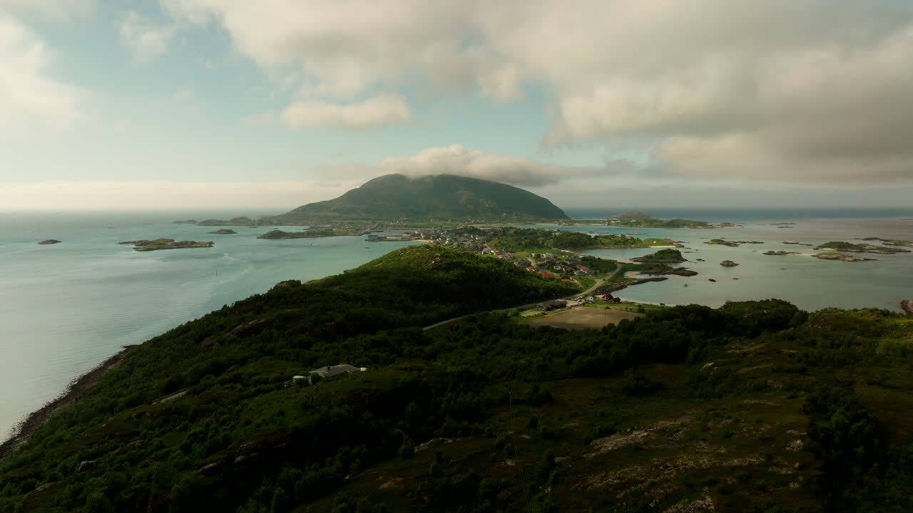 Aerial riser reveals scenic Sommaroya summer island in Kvaloya, Norway