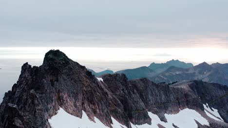 Aerial-View-Of-Kvænan-Pinnacles-In-Flakstadvag,-Senja-Island,-Norway