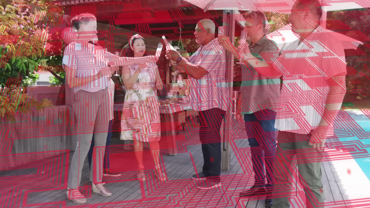 Senior man pouring drinks at deck party, guests toasting with animated confetti above flutes