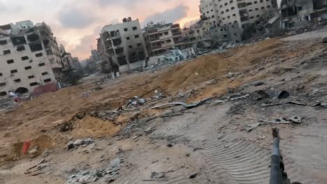 clips of buildings destroyed by israeli attacks in a civilian neighborhood in western gaza