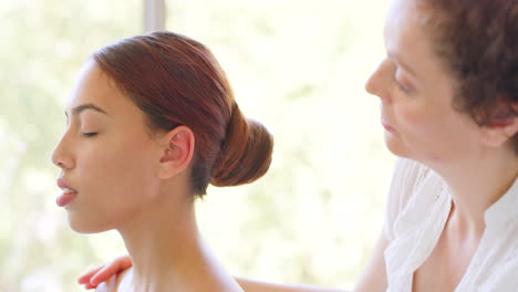 woman receiving massage therapy