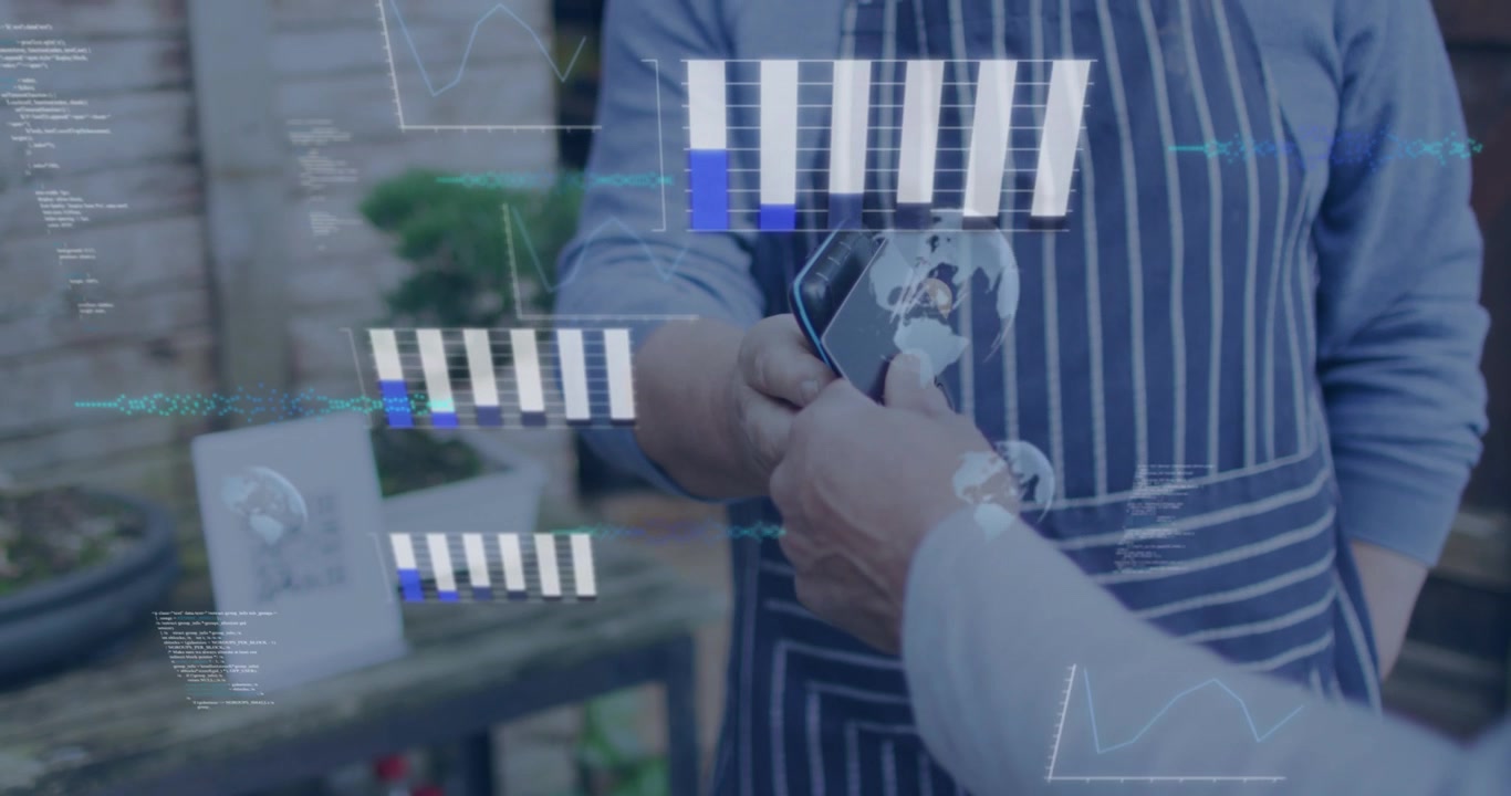 Vendor holding terminal while customer tapping card, starting growing data bars over retail stall