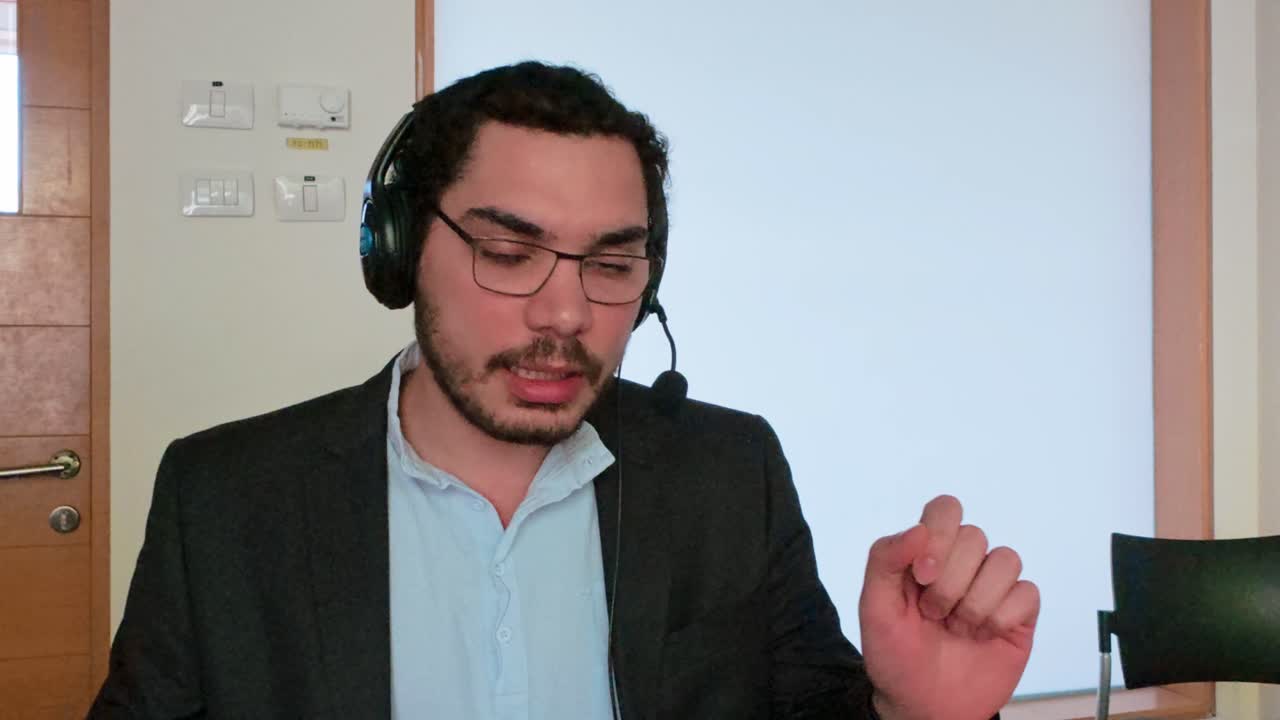 Man Explaining a Point During Remote Work Call