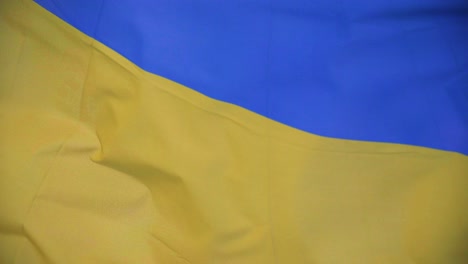 the shot of a ukrainian flag flapping in the wind