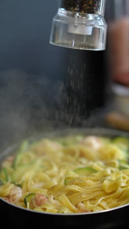 cooking fettuccine pasta with shrimp and zucchini