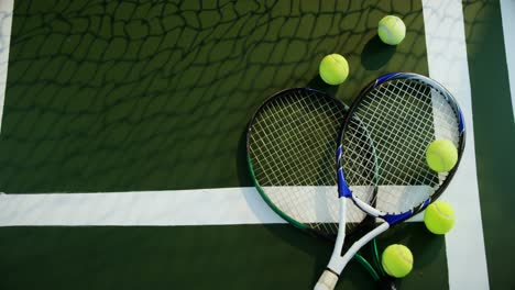 racket and tennis ball in court 4k