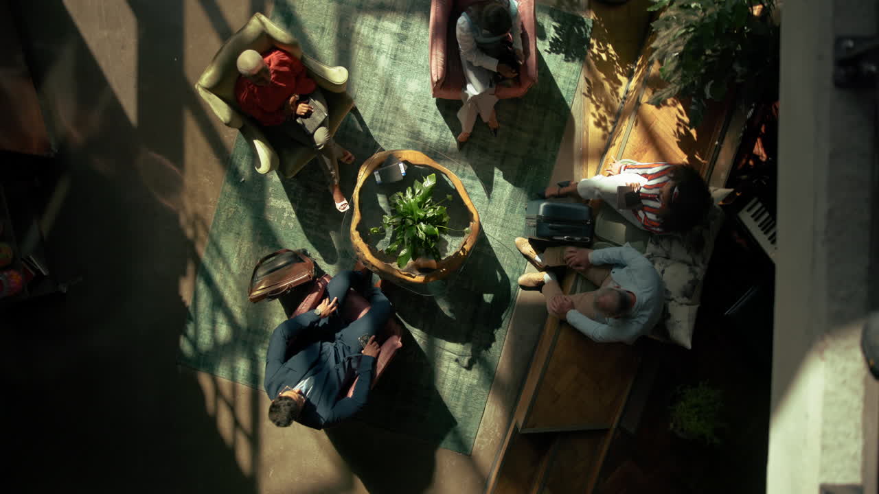 Hotel Lobby with People Waiting