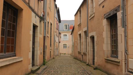 old buildings and narrow street in the historic center of angers, france - wide shot