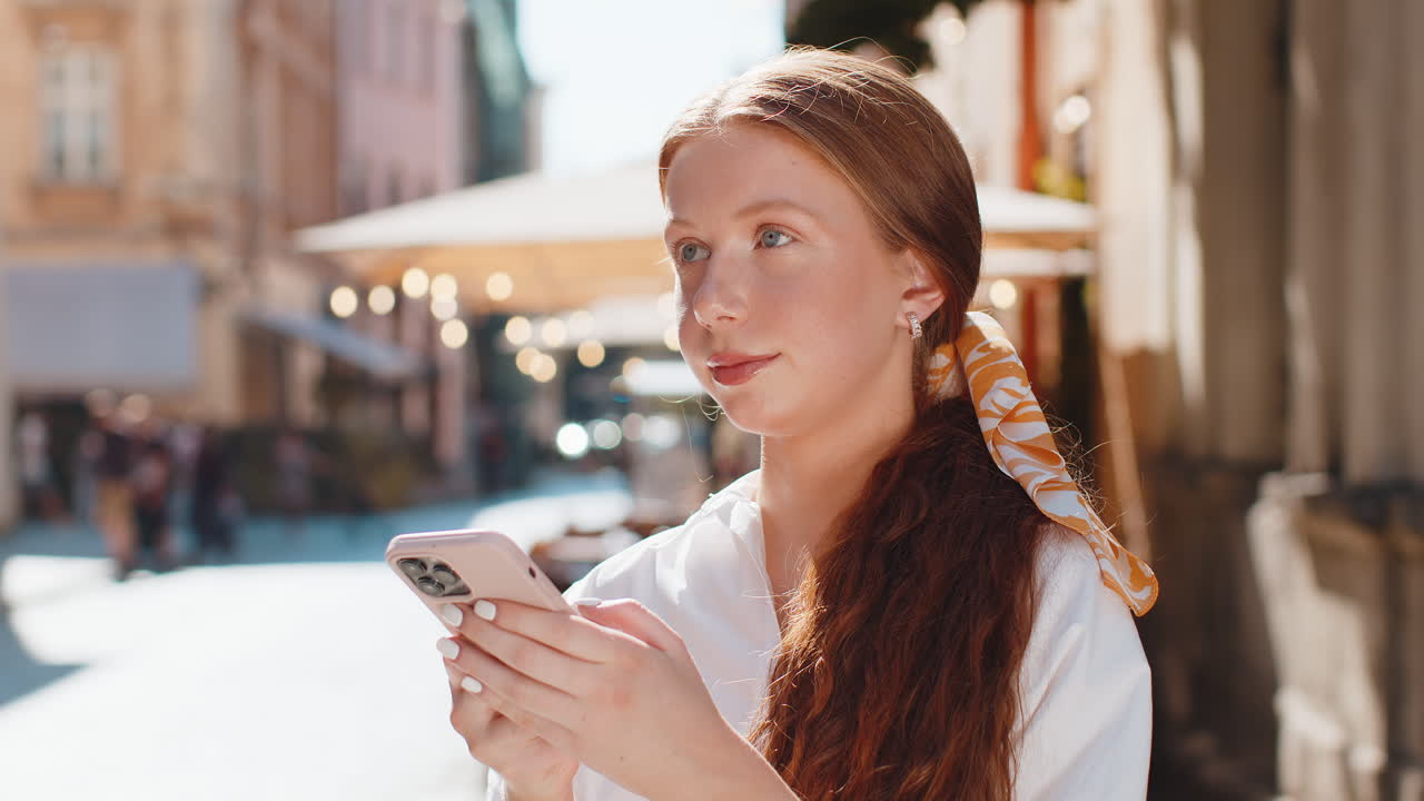 Teenager girl use smartphone typing text messages browsing internet finishing work chatting online