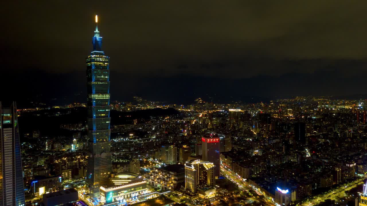 la noche iluminada paisaje de la ciudad de taipei famosa torre panorama aéreo 4k timelapse taiwán