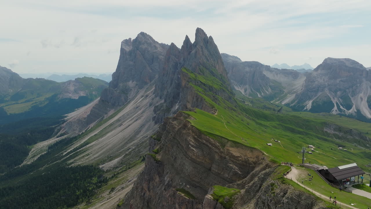 Aerial view of Seceda peak mountain in Dolomites, Italy during springtime