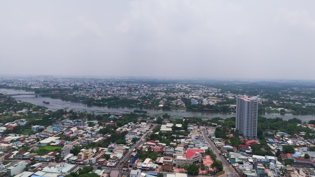 Aerial View Dolly of the City and the River in Binh Duong.