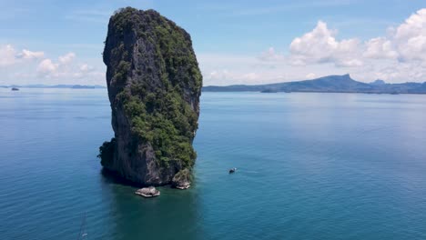 aerial of iconic limestone cliff at koh poda, krabi