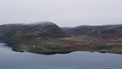 peaceful and mysterious atmosphere of the northern coastline with a small houses
