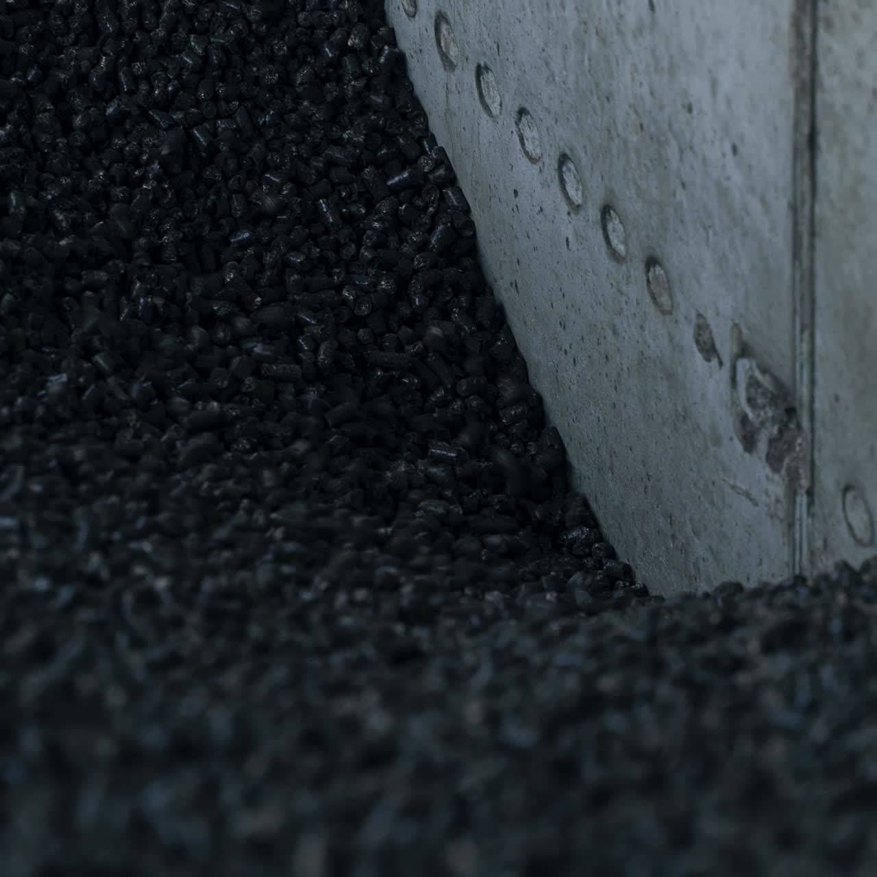 Full storage of coal in elevator storage. Dark elevator heating chemical coal