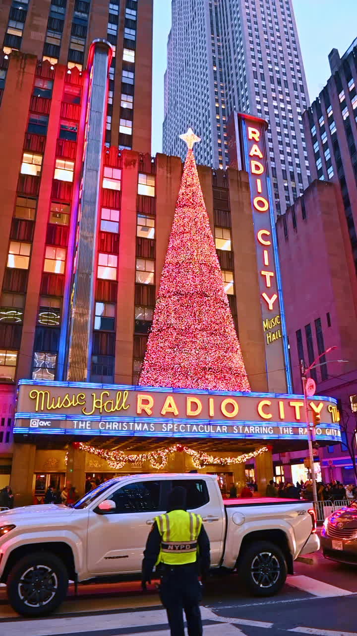New York, USA, 20 December 2025: Radio city holiday lights. Festive decor and a grand Christmas tree light up Radio City Music Hall for the holiday season in New York
