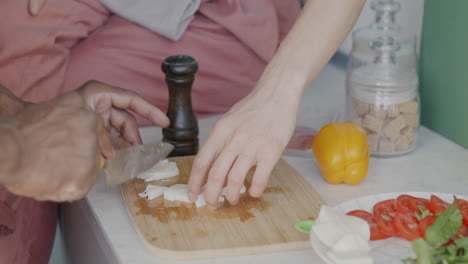 couple preparing a salad