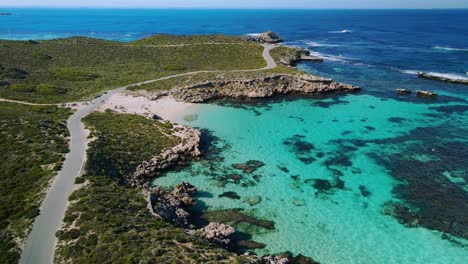 Aerial-view-of-Salmon-Bay,-Rottnest-Island,-Australia--orbit,-drone-shot