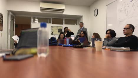office project meeting, attendees focused on the presentation