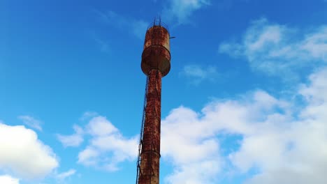 Old rusty soviet water tower