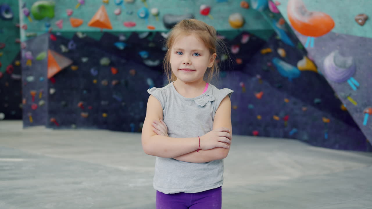 Young girl in an indoor climbing gym