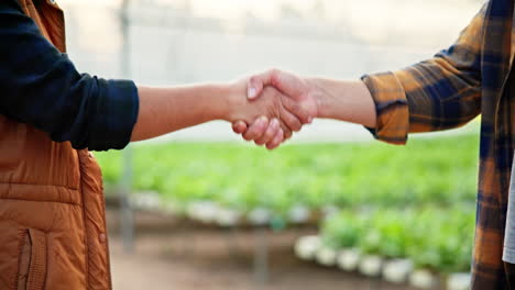 handshake in a greenhouse