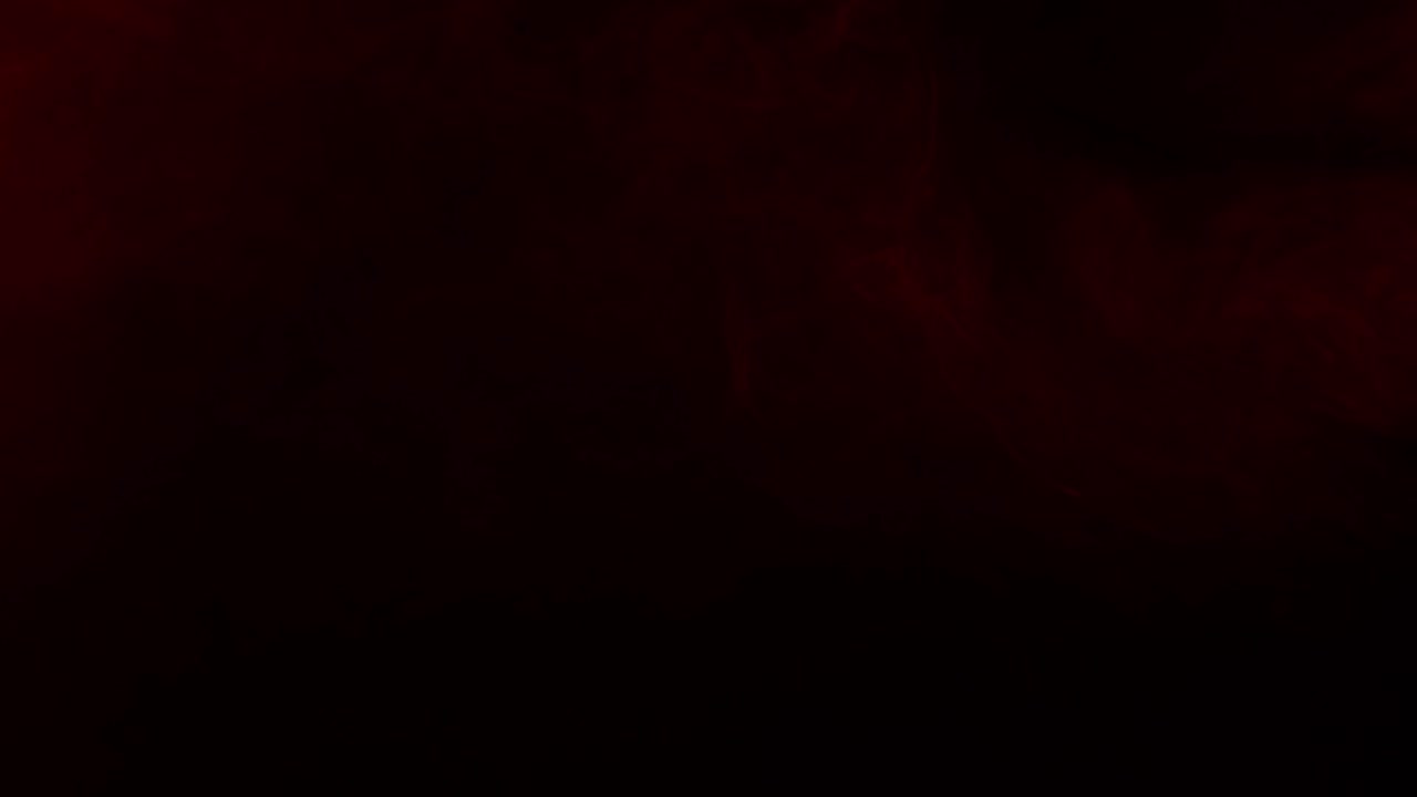 Subtle and soft red fog or smoke drifts slowly across a dark screen. Atmospheric overlay for creating a moody, horror, or dramatic ambiance,vfx