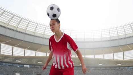 animation of biracial female soccer player over stadium