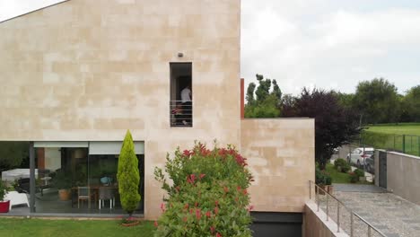 modern house exterior with garden and stone facade