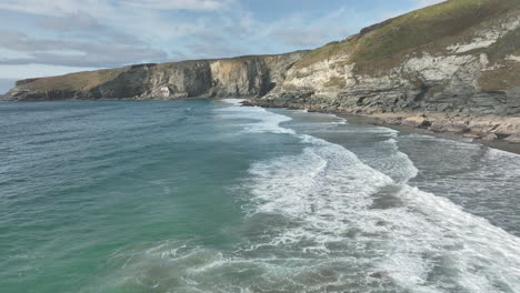 trebarwith beach, cornwall, aerial flight across beautiful sea to headland cliffs - mavic 3 cine prores 422 - clip 4