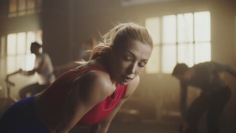 woman focused on workout in gym