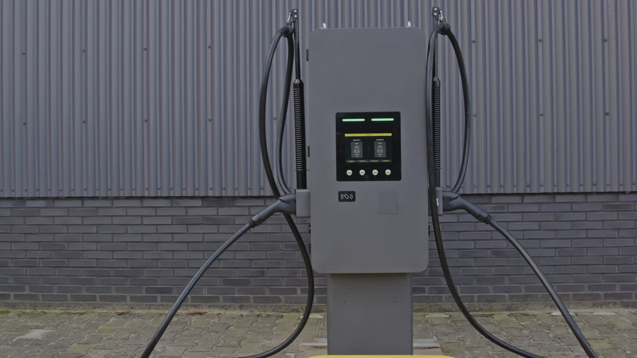 Slow dolly in of an electric vehicle charging station with a large display