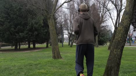 Teenager-Jogging-In-The-Park