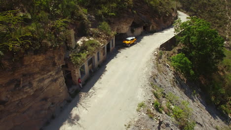 Aerial-Of-Motorcycle-Riders-Riding-Motorbike-On-Mountain-Roads