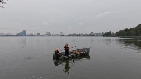 volunteers collecting trash from a river