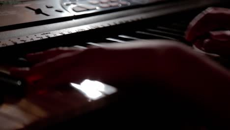 Close-up-of-a-keyboard-being-played