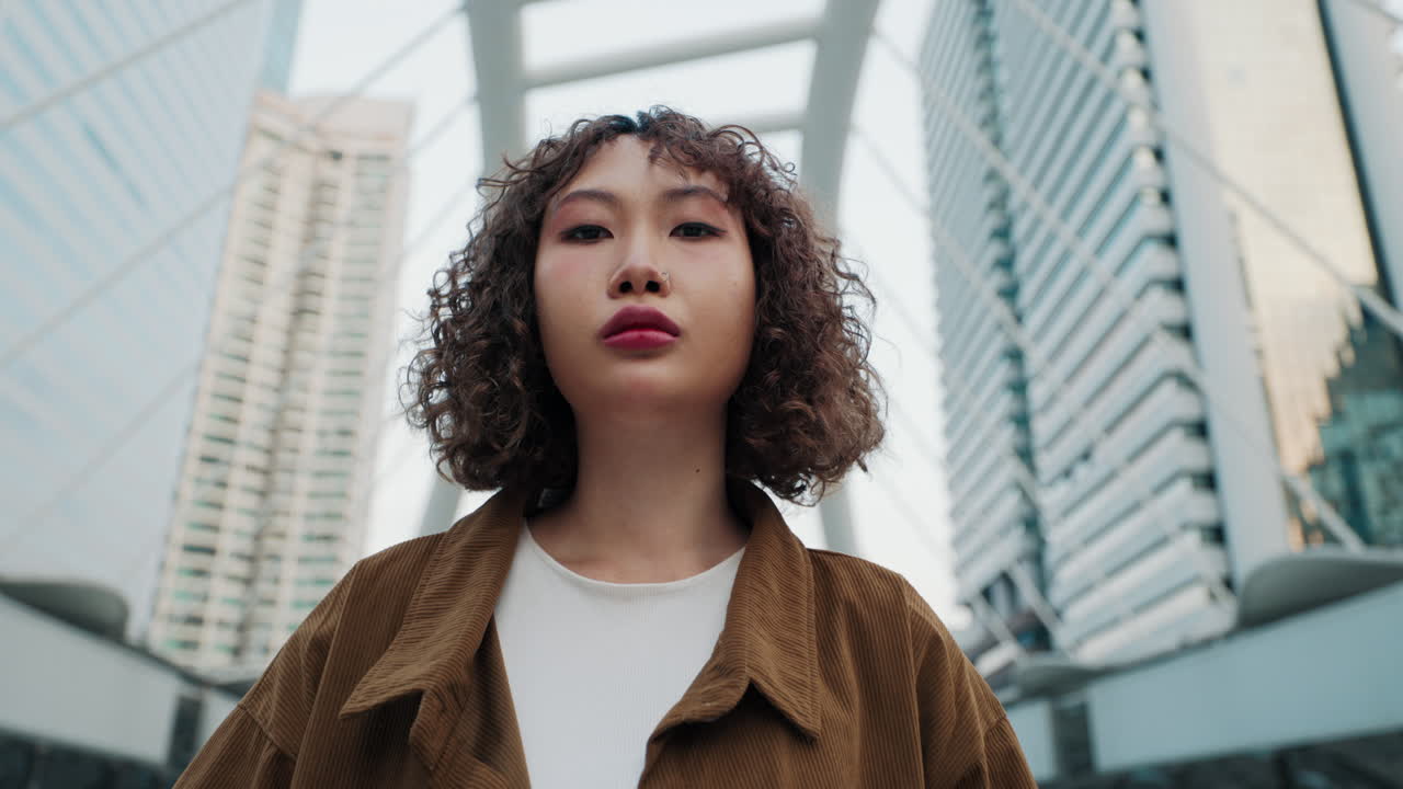Young Woman in Cityscape