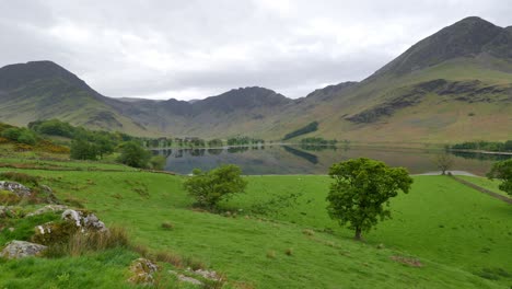 slow pan of buttermere lake, cumbria, england