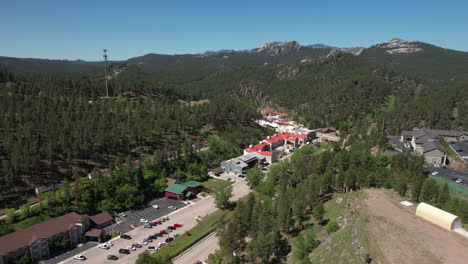 Aerial-View-of-Keystone,-South-Dakota-USA,-Small-Town-and-Landscape-on-Sunny-Day