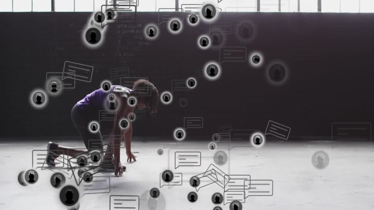 woman preparing to sprint in gym, holding crouch as avatars and messages clustering around her