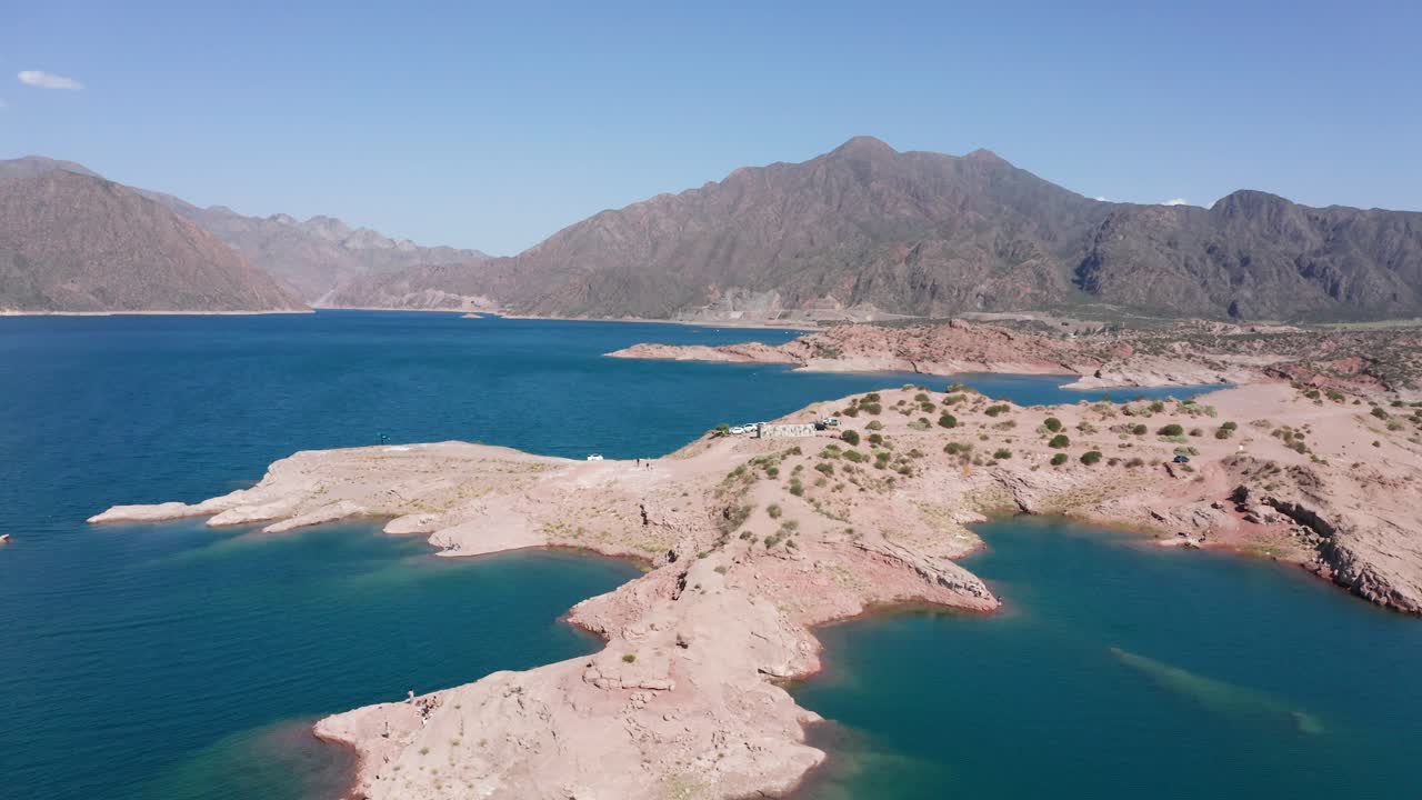 Aerial view dam full of water with limestone rocks shaping landscape