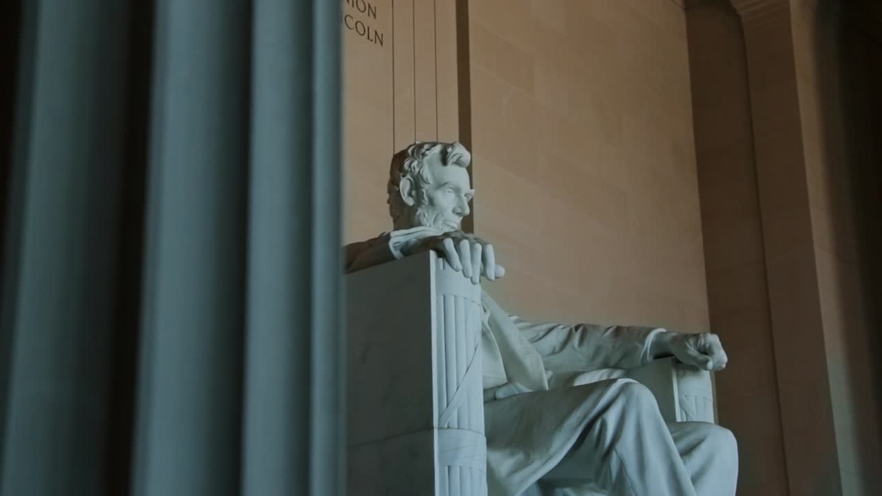 Beautiful architecture of the columns and statue inside the Savior of the Union, the Lincoln Memorial building in Washington, DC, USA.