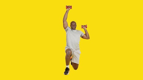 african man doing alternate military press using dumbbells