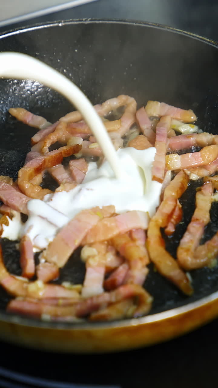 Cooking Bacon with Cream Sauce in a Pan