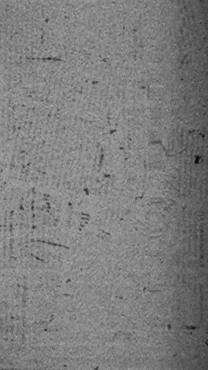 Abstract Grungy Grey Background with Film Grain and Scratches