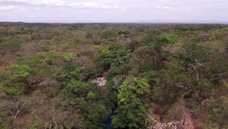 Explore-the-pristine-beauty-of-a-secluded-blue-river-winding-through-a-mountain-landscape